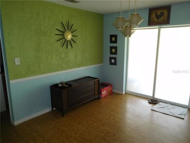 Dinette  off from kitchen, with sliding frosted do