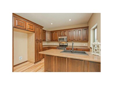 Kitchen. Custom cherry cabinet with mocha stain ha