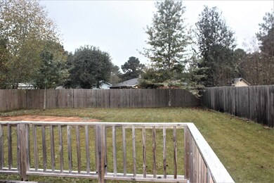 A nice size backyard to romp and roll in!