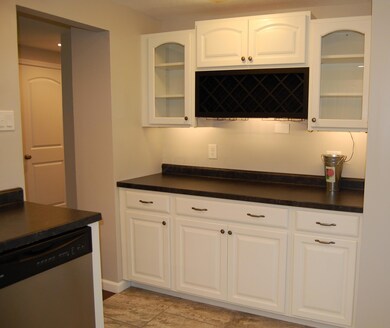 Kitchen cabinets with wine rack