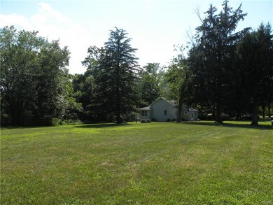 LARGE 1.16 CORNER ACRE LOT JUST STEPS FROM THE RIV