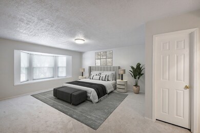 Virtually staged. Primary room large enough for a