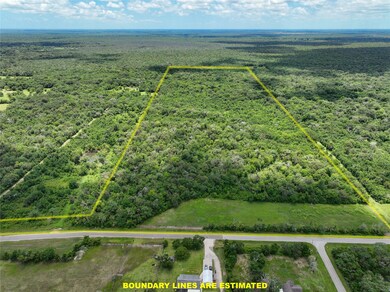 Wooded tract with pipeline easement at the road fr