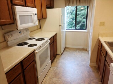 kitchen with brand new stove - pantry on the right