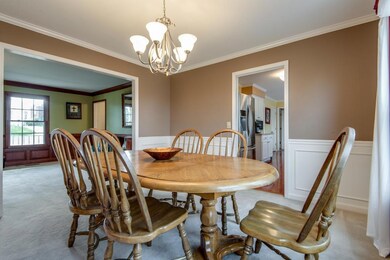 The formal dining room is the perfect place for family gatherings and holiday meals!