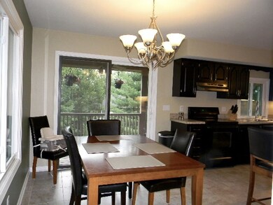 Access to large covered deck with two ceiling fans