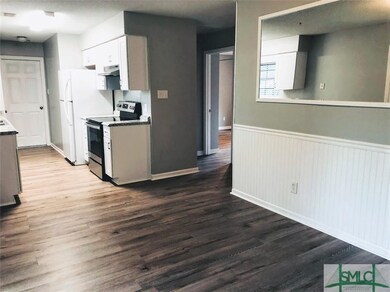 The dining room flows into the newly renovated gal