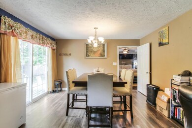 Large eat in dining area with view to the back yard.