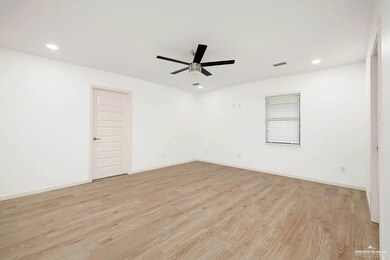 Unfurnished room with recessed lighting, ceiling fan, visible vents, and light wood-style floors