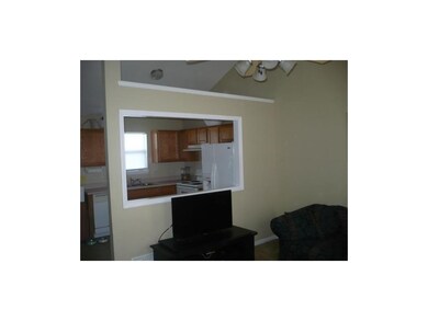 Open Floor Plan with Window from Kitchen to Living