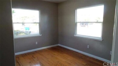 Front bedroom # 3. wood flooring.  Could make an o