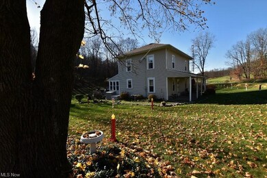 Sitting on 7.72 acres this charming home features 