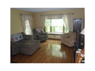 Living Room. NEW HARDWOOD FLOORING THROUGHOUT THE 