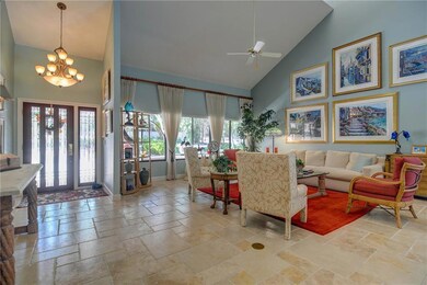 Open Concept design with Travertine flooring throu