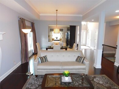 Living Room overlooking Formal Dining Room and Kit