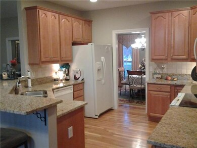 A Wonderful Social Kitchen, is a Focal Point of a Home! Italian Granite, Tumble Stone Back Splash. Perfect for entertaining, or simply putting away your garden produce. 