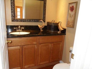 Remodeled 1/2 bath downstairs with granite counter