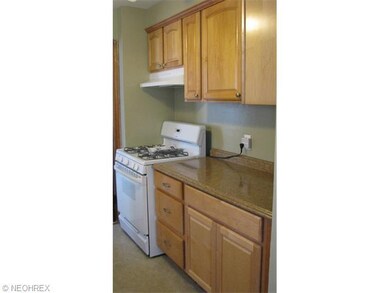 Newer kitchen featuring gas stove. Natural finish cabinets add to the light and bright kitchen.