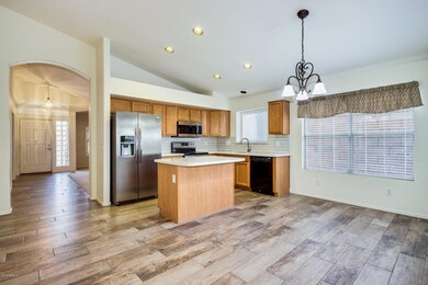 Kitchen w/Island & Casual Dining