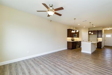 This photo is a representation of a similar home in the neighborhood.  Some features shown may be optional upgrades.  The colors represent those that are in the listed home.