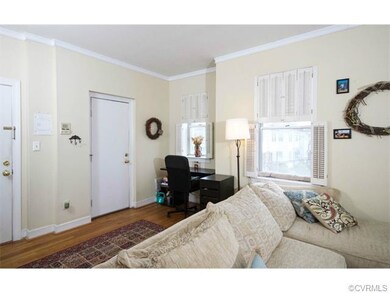 Another view of the living room, revealing the fro