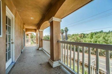 BALCONY OFF LIVING ROOM & KITCHEN