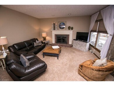 The plush carpet adds to the coziness of this fami