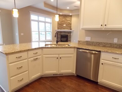 Home has community common area behind house with a