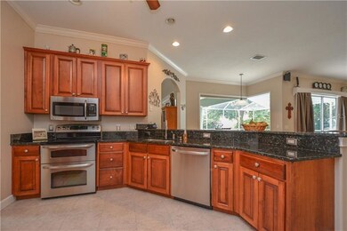 Kitchen with Double Oven and Granite Countertops