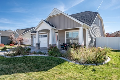 View of front of home featuring a porch, roof with shingles, driveway, board and batten siding, and a garage