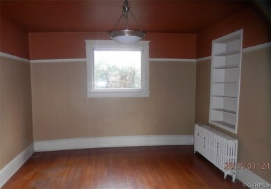 dinning room with built in shelving.