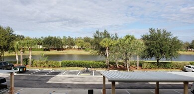 Uncovered parking lot with a water view