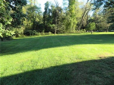 The rear yard is expansive with a gentle grade.  P