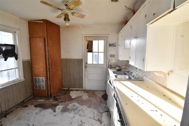Kitchen featuring a sink, plenty of natural light,