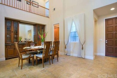 Formal Dining room with vaulted ceilings and built