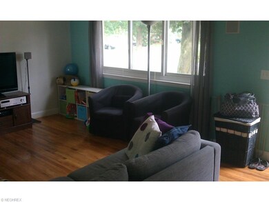 LIVING ROOM WITH BEAUTIFUL HARDWOOD FLOORS AND LAR