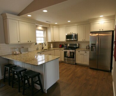 Custom Decora' Cabinets with soft close and granit