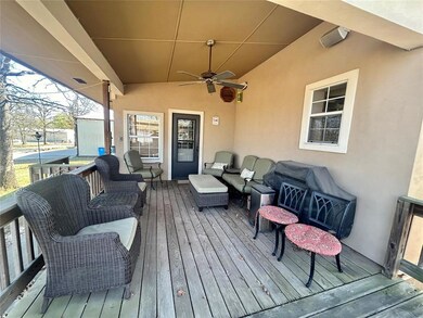 Wooden deck featuring an outdoor living space and 
