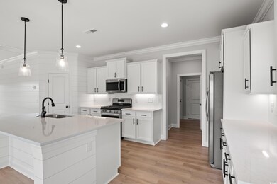 Kitchen featuring appliances with stainless steel 