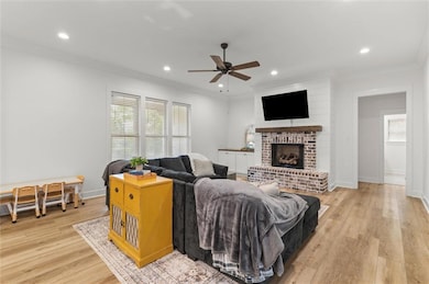 Living room featuring plenty of natural light, a c
