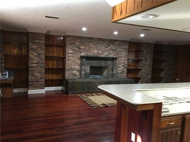 Beautiful built in's, gas fireplace, and wood floo