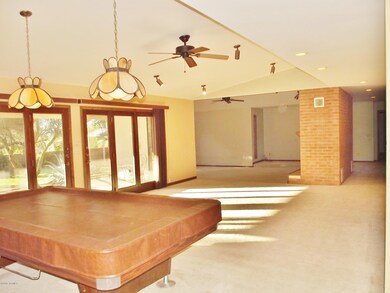 Family Rm Looking Into Sunken Lvg Rm