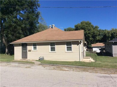 View of south side of home with off street parking