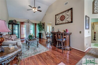Formal living room. Hardwood floors, ceiling fan, 