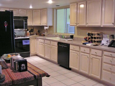 KITCHEN LOOKS INTO AZ ROOM