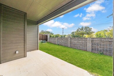 Fenced backyard featuring a patio area