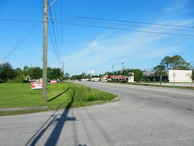 Lot on the left and looking northwest on Broadway (FM 518)