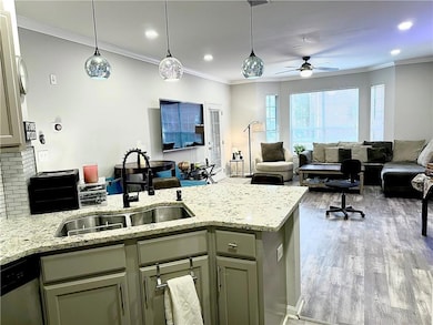 Kitchen featuring light stone countertops, ceiling