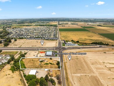 Aerial overview of property's location with property parcel outlined
