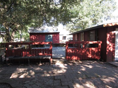 Back deck with storage shed.